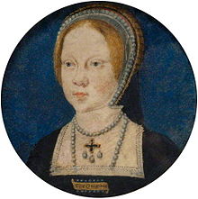 Marie comme une fille au nez retroussé avec les cheveux rouges