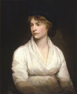 Gauche prospectifs demi-longueur portrait d'une femme enceinte éventuellement dans une robe blanche