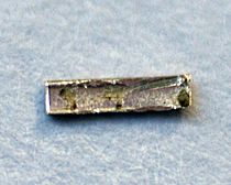 Image: Radium electrochapado sobre una lámina de cobre y cubierto con poliuretano para evitar la reacción con el aire